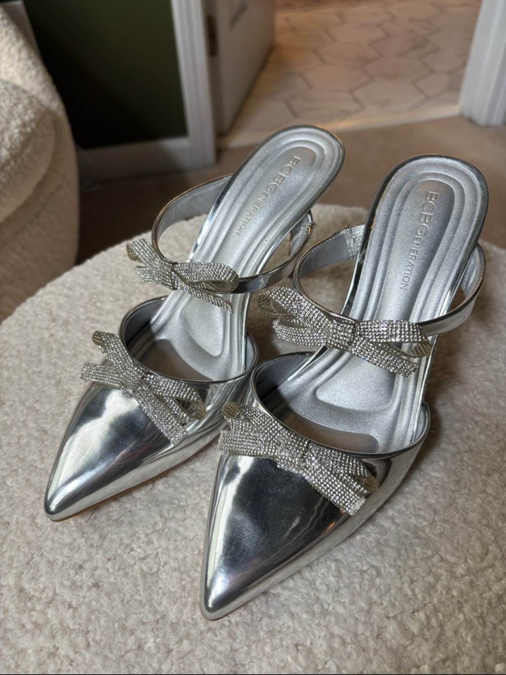 BCBGeneration Silver Rhinestone Bow Pointed Mule Heels